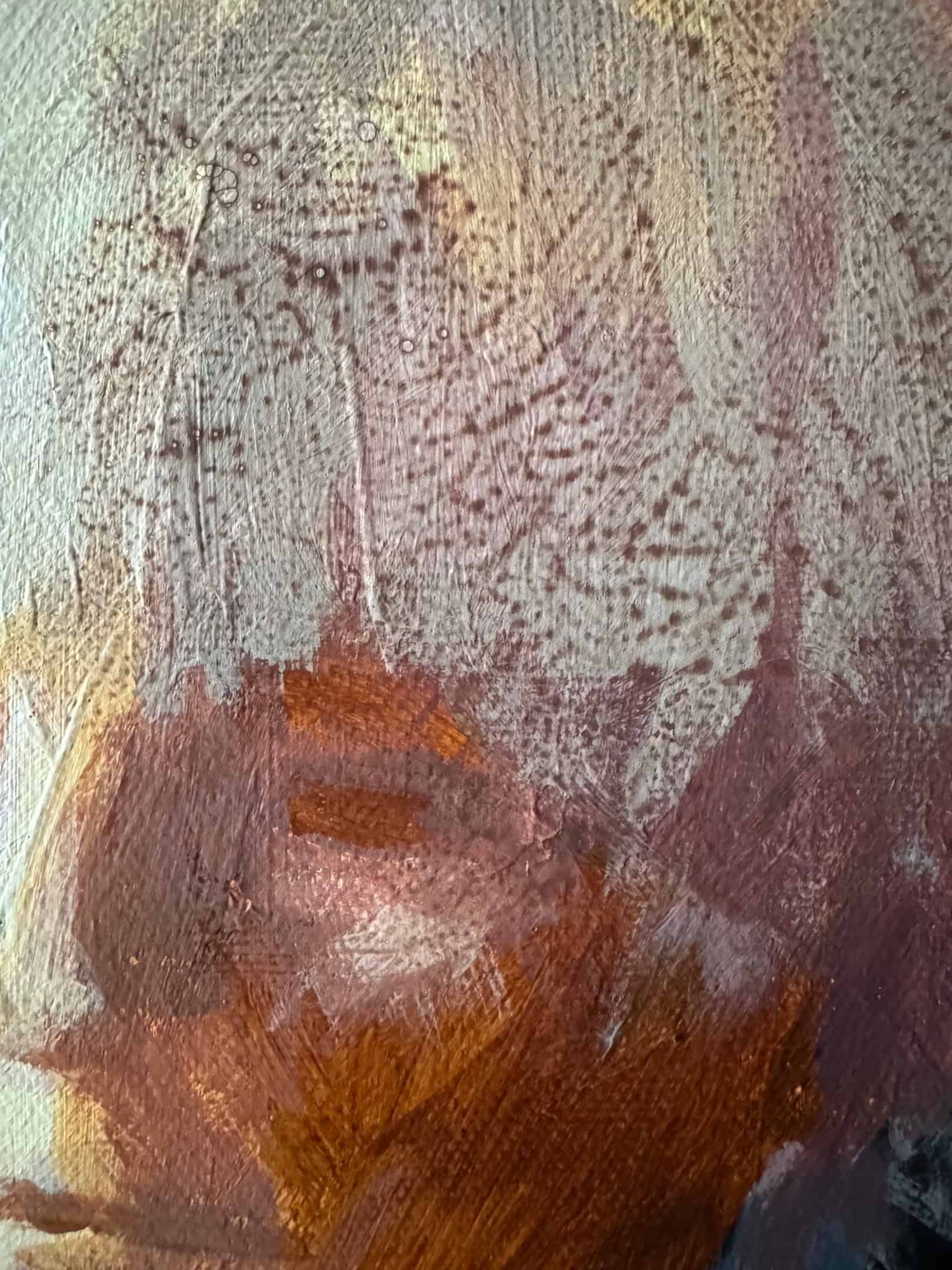 Close up of face with a patina paint glazing technique.